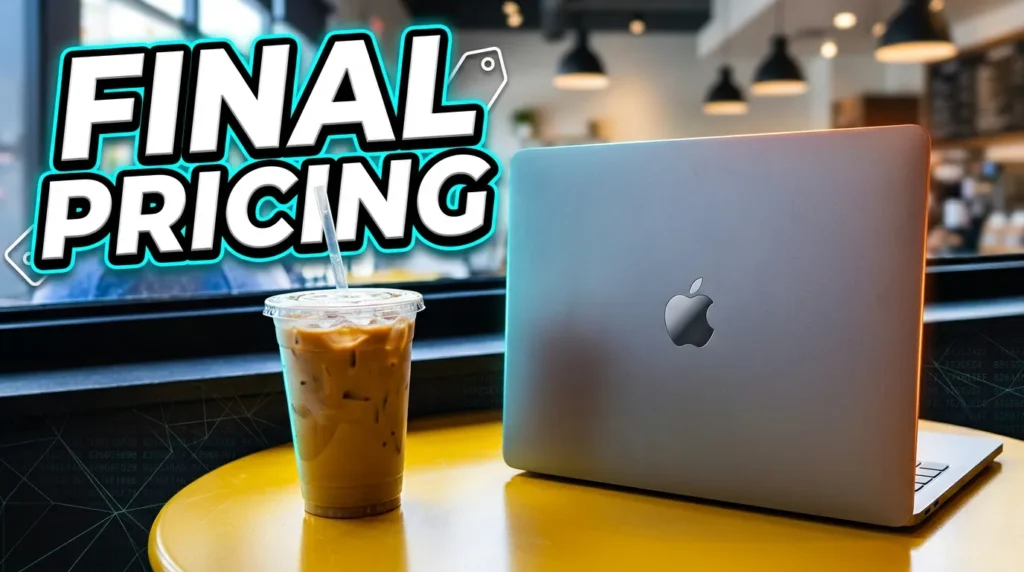 Silver Apple MacBook laptop on a yellow table with iced coffee.